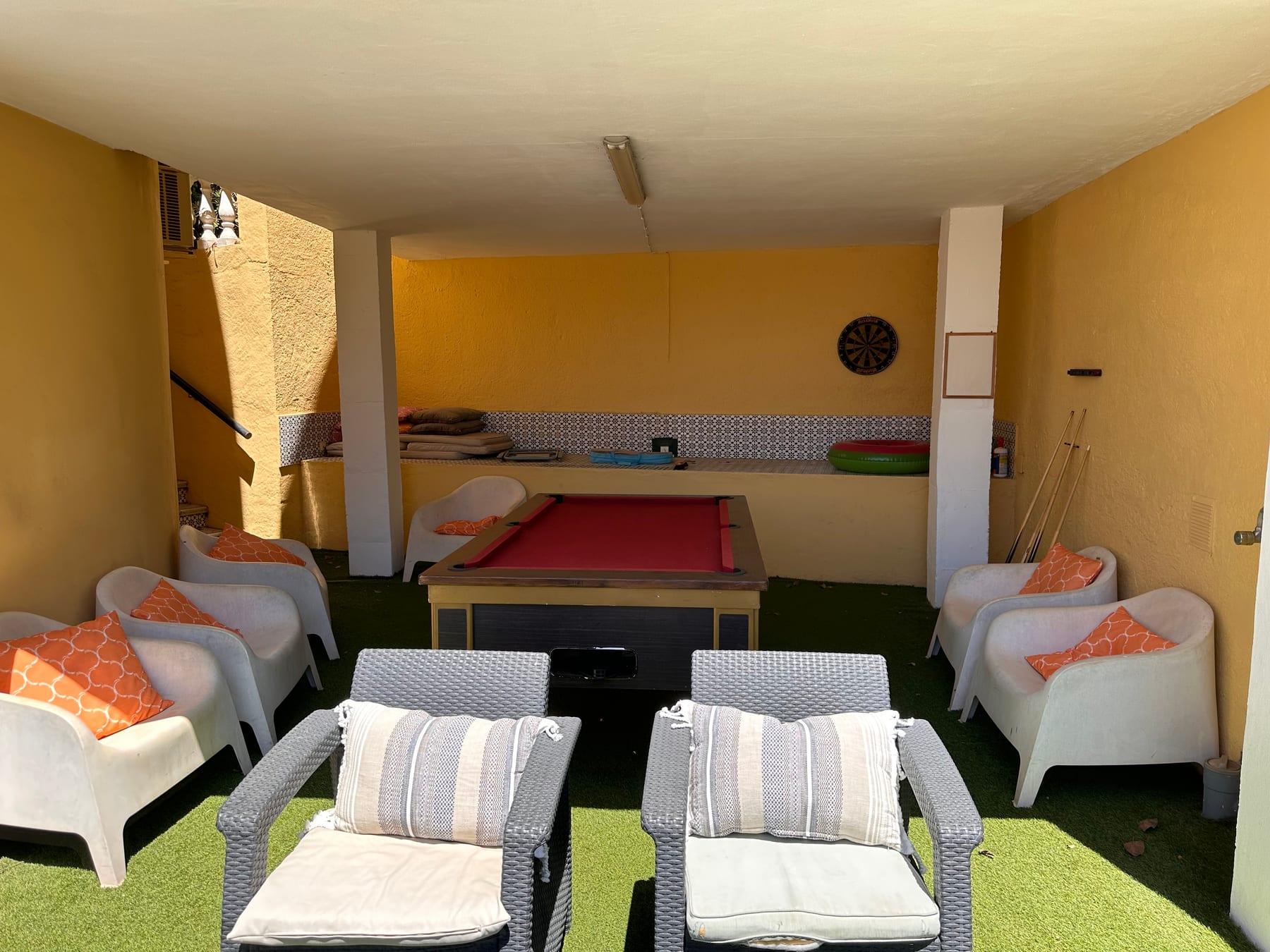 Outdoor games and entertainment area with pool table